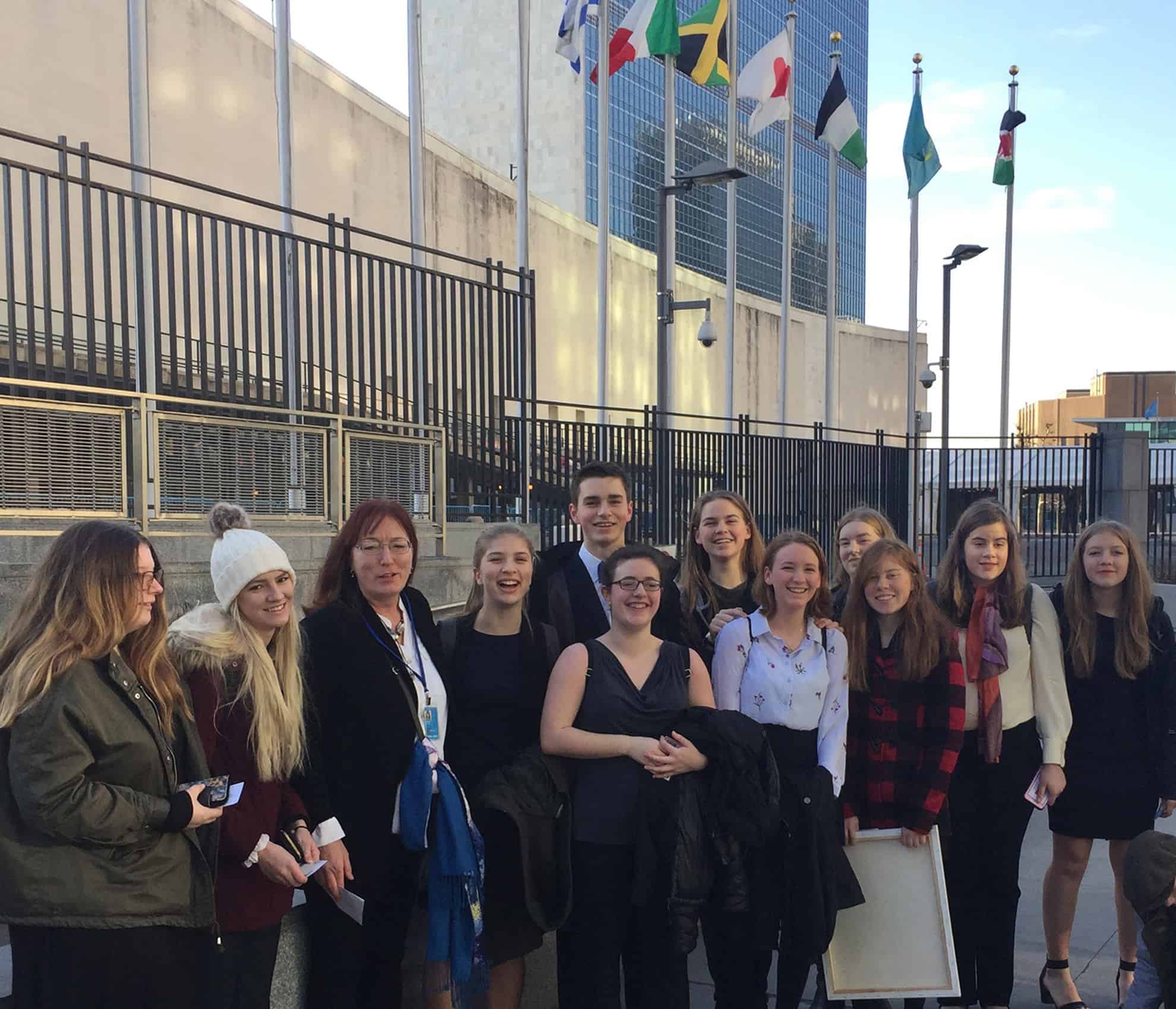 The Trumansburg team awaiting entrance to the UN prior to the final session of the Student Leadership Conference. Shown are (left to right) Arianna Wright, Zoe Golden, Gertrude Noden, Sarah Wertis, Logan Bonn, Georgia Mechalke, Jadyn Wright, Lilian Oxley, Margaret McCurdy, Virginia Clifford, Elizabeth Gardner, and Clair Williamson.